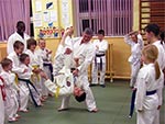 Sensei demonstrates a technique
