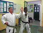 Sensei demonstrates to the class