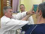 Sensei demonstrates a technique