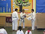 Student receiving their award